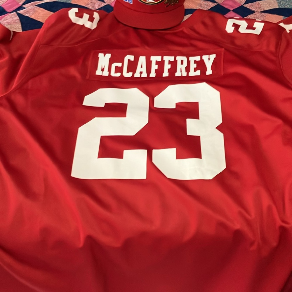 Red and White 49ers jersey. Not stitched. Like new